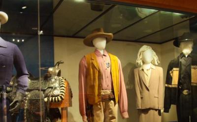 mannequins with western-style clothing on display