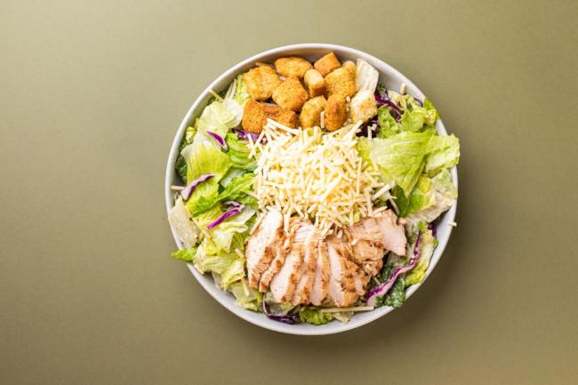 view from top of salad with chicken croutons parmesan cheese