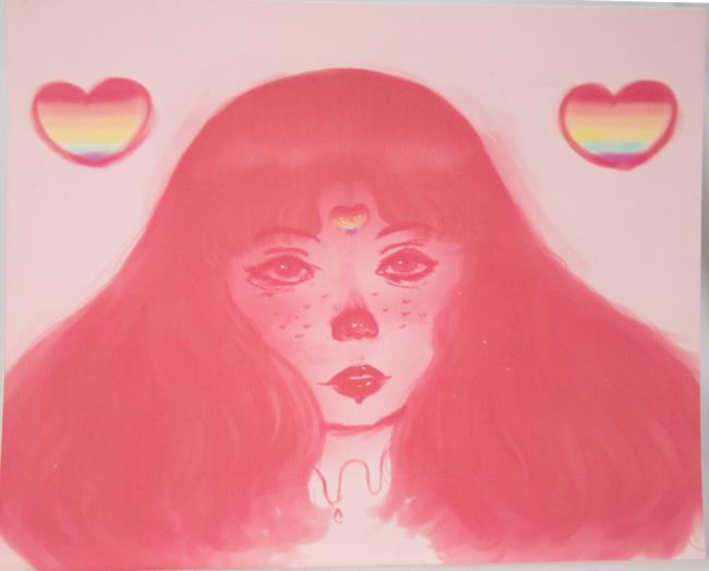 woman in pink surrounded by pride-colored hearts