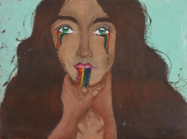 a woman cries rainbow tears
