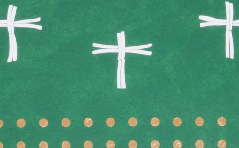 A green tapestry with five white crosses arranged in a pattern above a horizontal line of gold dots near the bottom.