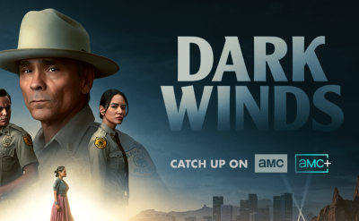 Promotional image for the TV series Dark Winds, featuring three cast members in police uniforms against a desert landscape with the title and AMC streaming information.