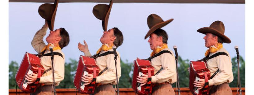 A man in cowboy attire, holding an accordion, repeatedly tips his hat in a sequence of poses on stage. Large text above reads “Sourdough Slim,” and below, “Last of the Vaudeville Cowboys.”.